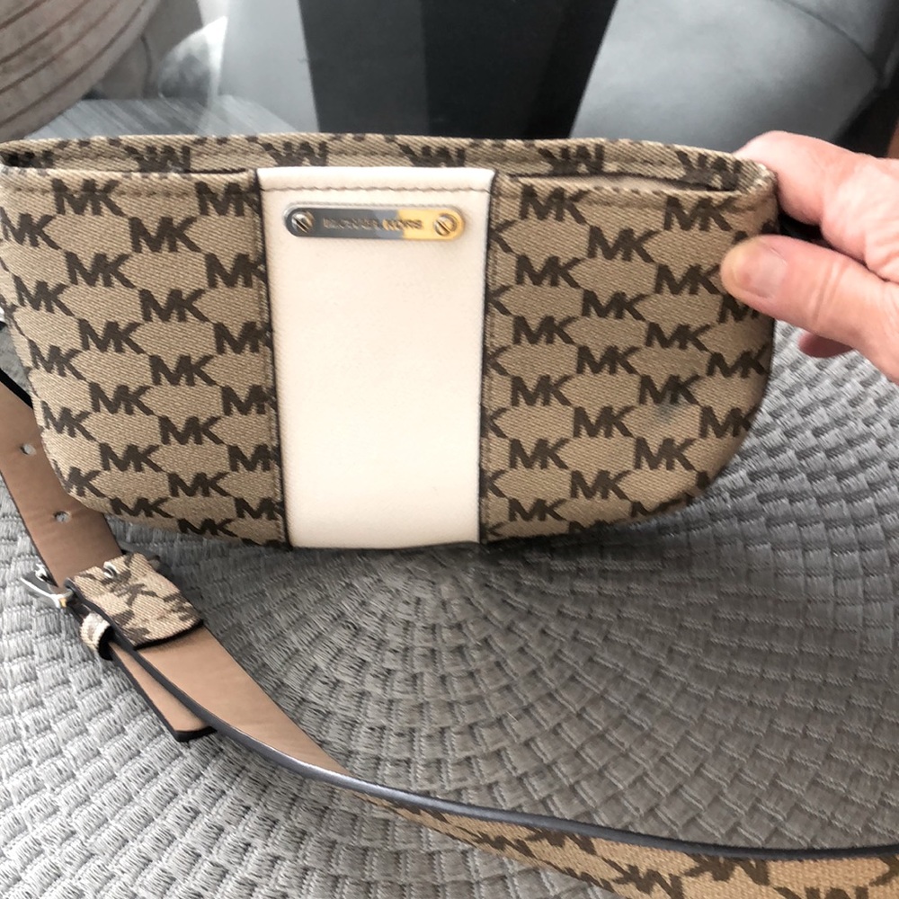 Very cute small bag with a little tiny stain on the side